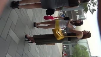 Black Stilettos Short Yellow Skirt Chinese model candid