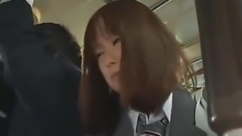 Schoolgirl has to give a blowjob in a Bus