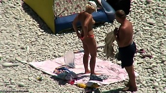 Hidden vid of French woman fingered on beach