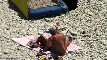 Hidden vid of French woman fingered on beach