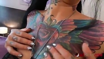 Busty tattooed Adel Asanti has her holes stretched wide