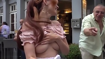 Jeny Smith flashing her perfect tits to strangers on the street while taking a selfie.