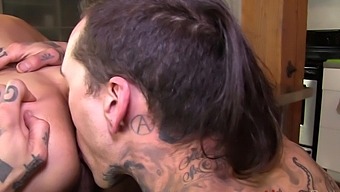 Tattooed gay lovers have sex on the kitchen table in HD video