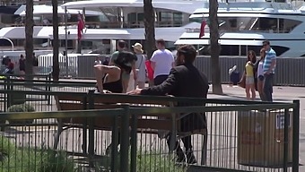Outdoor sexual fun in the park with a couple and their slave girl