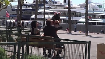 Outdoor sexual fun in the park with a couple and their slave girl