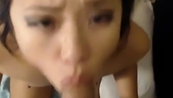 Hot Korean Babe Shows Talent on Sucking Cock