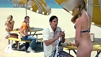 Naked celebrity flashes her pussy to a stranger on the beach