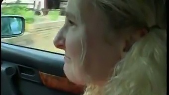 Sexy blonde can't help herself but play with her pussy in her BF's BMW