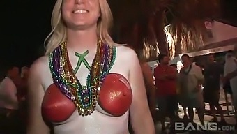 The horny chicks in this video can't wait to show off their tits and body paint