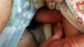 Boy and girl in wet goodnites diapers plat with a dildo sex