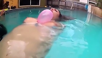 Beautiful amateur brunette trained in bondage in the pool