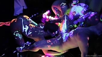 Neon party girl Abella Danger sucks a dick and dances on a stage