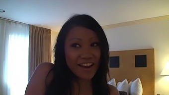 Seductive Asian chick Fallon drops on her knees to suck a dick