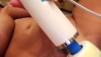 Big breasted milf vibrating and fingering her aching pussy