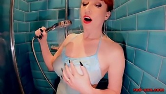 Horny Red XXX MILF masturbates in the shower
