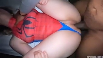 Blonde babe gets fucked missionary in Spidergirl suit by BBC (interracial)
