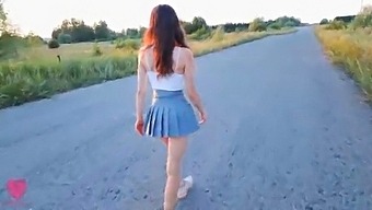 A romantic evening walk in nature ended with sex in clothes in a beautiful meadow next to the road