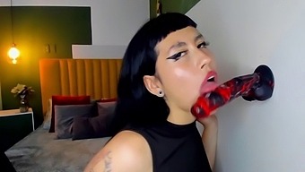 Emo latina sucking a strange dildo