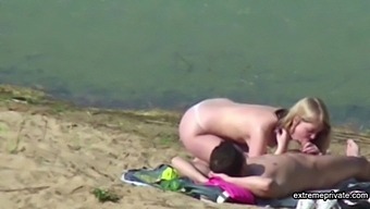 Amateur couple caught having sex on a beach by stepdaughter
