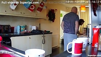 Mature couple engages in steamy kitchen sex