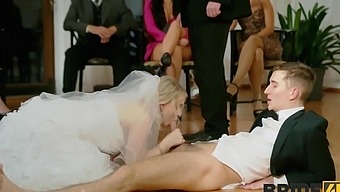 Clothed bride gets her feet worshipped and her ass pounded in a wedding orgy