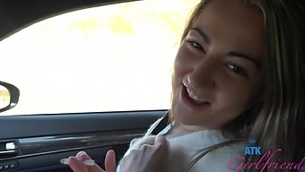 Kinky Lily Adams enjoys while getting fingered in the vehicle.