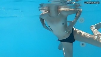 Horny Hungarian babe Bonnie enjoys a solo swim