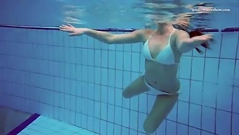 Russian teen Alla swims naked in a hot pool