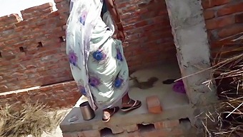 Amazing Indian bhabhi enjoys peeing on her rooftop and fingering herself