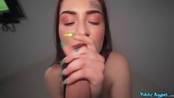 POV video of a tattooed slender girl taking a hard cock in her mouth and getting facial