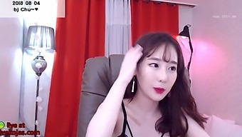 Busty Korean babe indulges in some solo masturbation