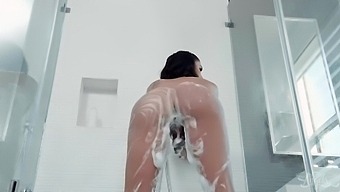 Watch a gorgeous shemale tease and masturbate in the shower