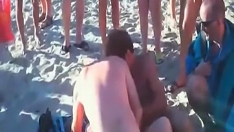Group sex with swingers at a nudist beach party
