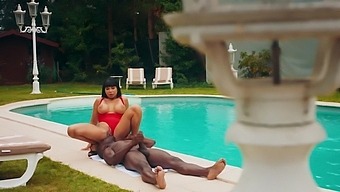 Busty Valentina Ricci rides a black manhood in a pool