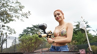 Petite redhead gets paintballed and fucked by pornstar