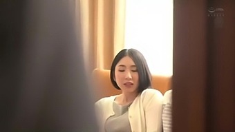 A hot Asian wife gets a blowjob from her husband's father