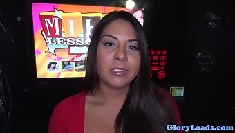 Latina babe sucks big black cock in gloryhole